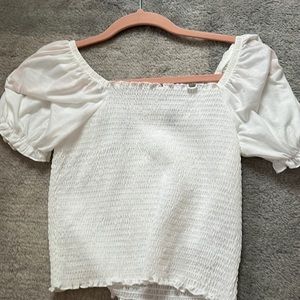 White ruffle top with puff sleeves